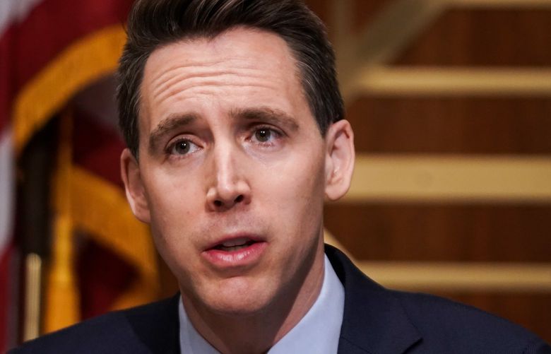Sen. Josh Hawley, R-Mo., asks questions during a Senate Homeland Security  Governmental Affairs Committee hearing to discuss election security and the 2020 election process on Dec. 16. (Greg Nash/Abaca Press/TNS) 31119484W 31119484W