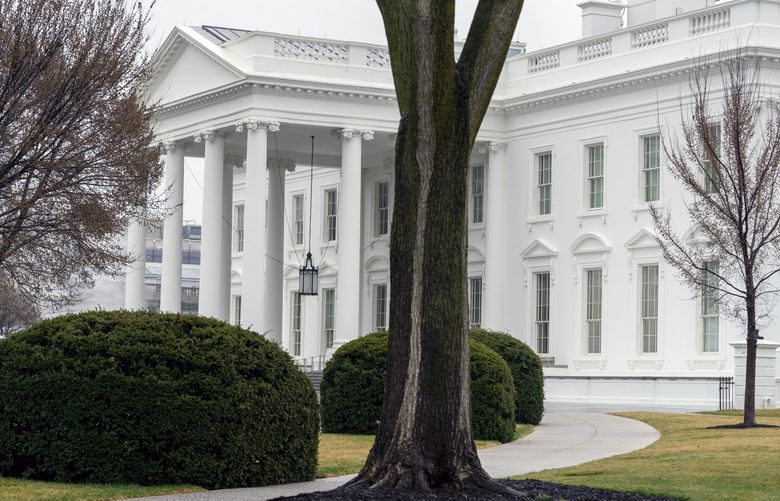 FILE – The White House is shown in Washington on March 18, 2021. The Biden administration is rolling out a new initiative aimed at reducing suicides by gun and combating the significant increases in suicides by members of the military and veterans. The White House is announcing the new plan Tuesday.  (AP Photo/Andrew Harnik, file) WX201 WX201