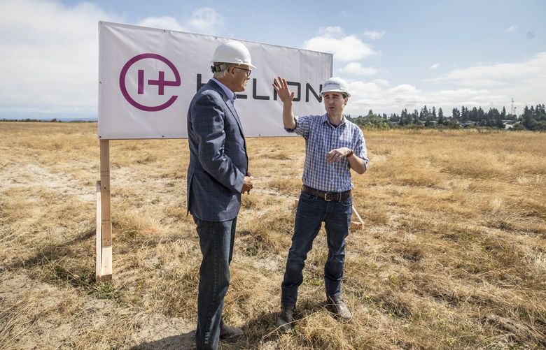 Tuesday, July 27, 2021.     The CEO of Helion Energy, David Kirtley, at right with Gov. Jay Inslee on the site in Everett that will house the new polaris generating building for their industrial electricity producing process. 217749