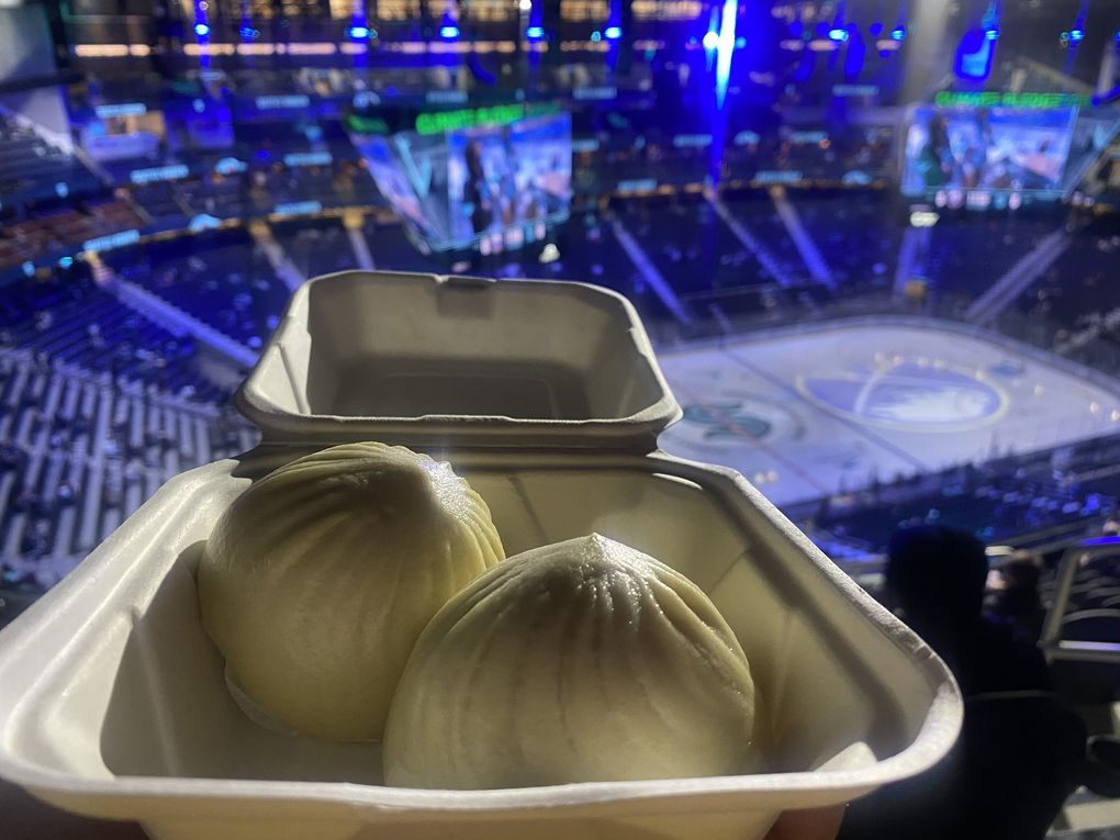Din Tai Fung serves a limited menu at Climate Pledge Arena, including these kurobuta pork buns — certainly not your standard arena fare. (Trevor Lenzmeier / The Seattle Times)