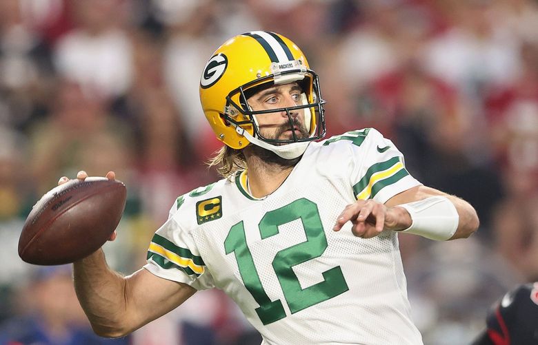 Quarterback Aaron Rodgers (12) of the Green Bay Packers throws a pass against the Arizona Cardinals at State Farm Stadium on Oct. 28, 2021 in Glendale, Arizona. The Packers defeated the Cardinals 24-21. (Christian Petersen/Getty Images/TNS) 31200868W 31200868W