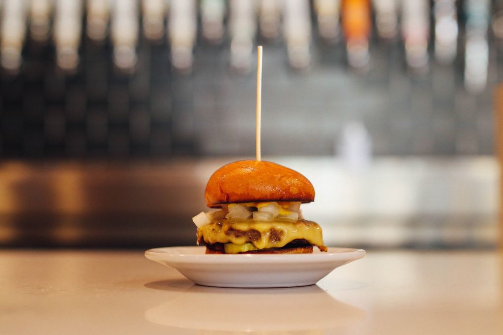 The vegan slider at The Belmont Fermentorium, with its cheese made from coconuts and its patty made from pea protein, is a shockingly convincing analogue of the regular, cow-based hamburger. (Courtesy of the Belmont Fermentorium)