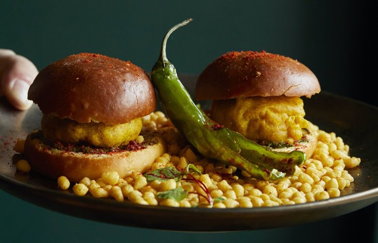 Kricket Club, the hot, new bar restaurant in Ravenna, features bar bites and shared plates including the Vada Pao, beetroot croquettes with ghati masala, shishito.