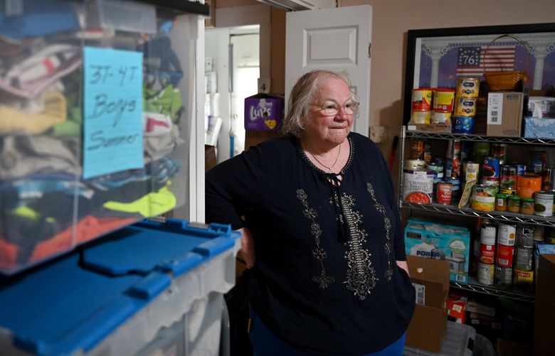 Tere Haring, the founder and executive director of the antiabortion Allied Women’s Center in San Antonio, looks over items donated to her organization, which helps women with rent, utilities, diapers, clothing and other needs for up to five years after a child is born. MUST CREDIT: Washington Post photo by Katherine Frey.