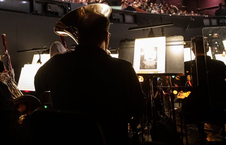 The PNB orchestra performs at the start of the Pacific Northwest Ballet’s Nutcracker performance at McCaw Hall on Dec. 21, 2019. 212481