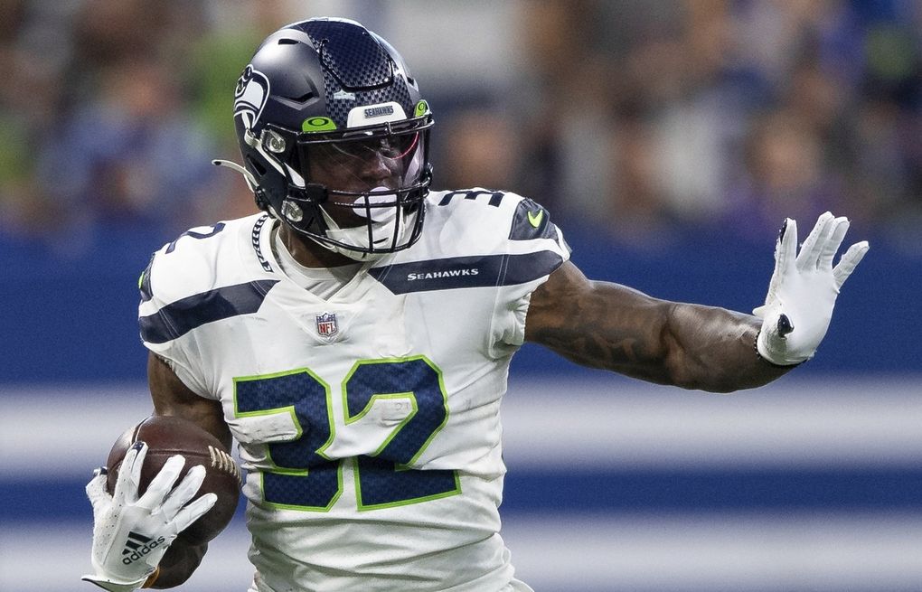 Seahawks RB Chris Carson doesn't practice Wednesday while team continues to  evaluate neck injury