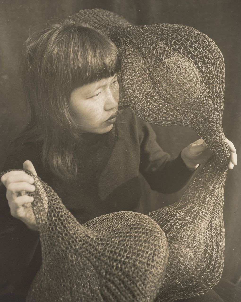 “Ruth Asawa, Sculptor,” 1952, by Imogen Cunningham. (Randy Dodson, Fine Arts Museums of San Francisco, Imogen Cunningham Trust)
