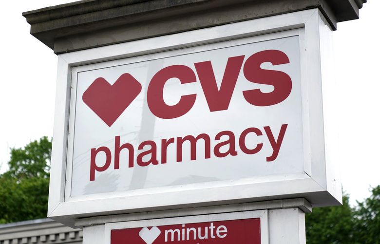 This is a CVS Pharmacy sign is shown in Mount Lebanon, Pa., on Monday May 3, 2021.     (AP Photo/Gene J. Puskar) 
