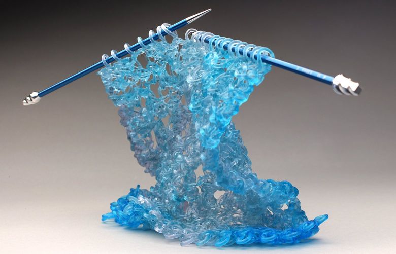 The knitted glass sculpture “Blue Me Away” by Seattle’s Carol Milne is one of the artworks featured in Artists Sunday.