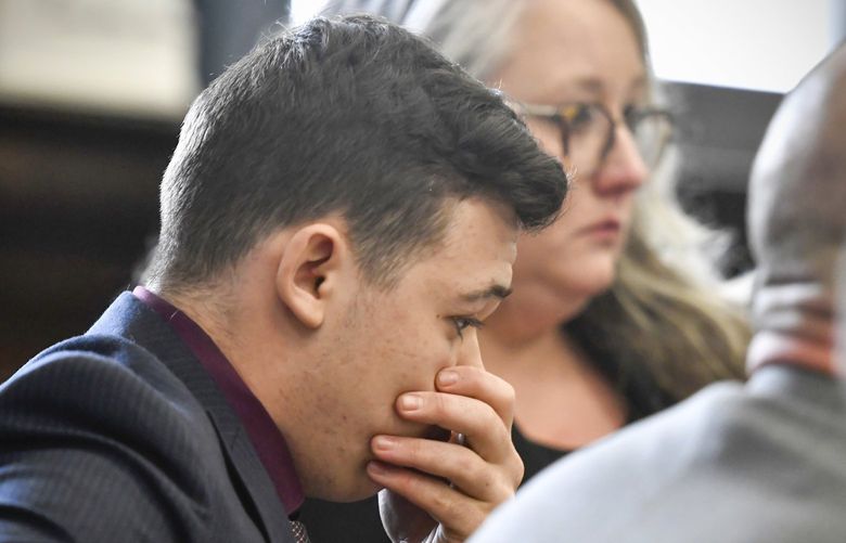 Kyle Rittenhouse puts his hand over his face after he is found not guilty on all counts at the Kenosha County Courthouse in Kenosha, Wis., on Friday, Nov. 19, 2021.  The jury came back with its verdict afer close to 3 1/2 days of deliberation.  (Sean Krajacic/The Kenosha News via AP, Pool) WIKEN101
