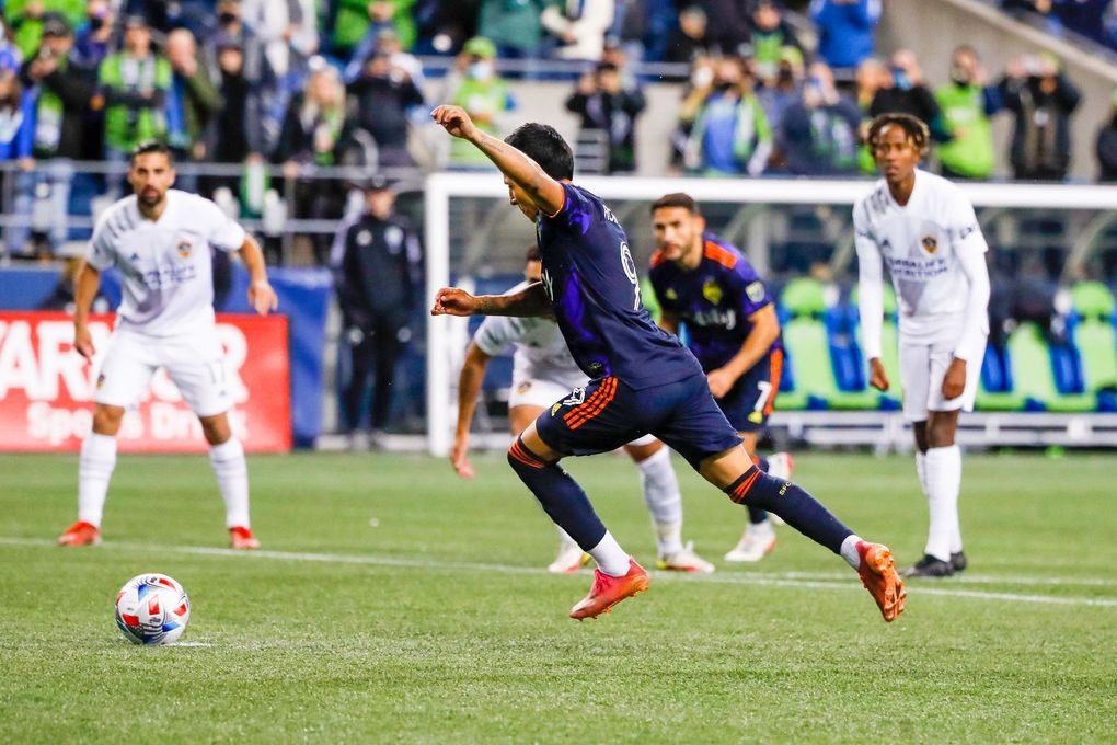 Seattle Sounders FC forward Raul Ruidiaz takes a penalty for the equalizer in the second half on Monday, November 1, 2021 in Seattle. (Jennifer Buchanan / The Seattle Times)