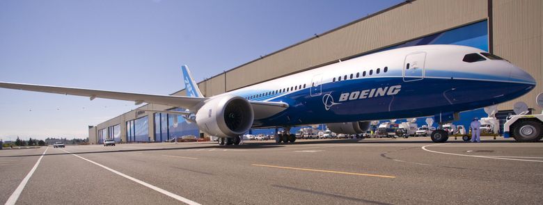 The Boeing 787 Dreamliner on the day of its rollout, July 8, 2007, outside the factory doors in Everett. (Mike Siegel / The Seattle Times, 2007)