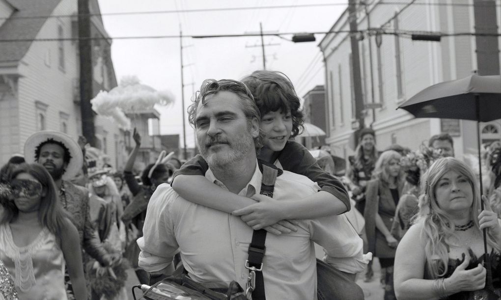 Joaquin Phoenix, left, and Woody Norman in “C’mon C’mon.” (A24 Films)