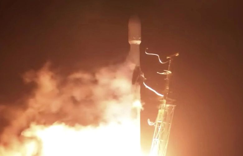 In this image taken from NASA video, the SpaceX Falcon 9 rocket with the Double Asteroid Redirection Test, or DART, spacecraft onboard, lifts off Tuesday, Nov. 23, 2021, from Vandenberg Space Force Base in Calif. NASA launched the spacecraft Tuesday night on a mission to smash into an asteroid and test whether it would be possible to knock a speeding space rock off course if one were to threaten Earth. (NASA via AP) CAHO601 CAHO601