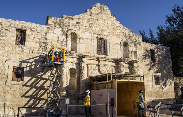 The Alamo Church, part of the Alamo grounds, undergoing renovation in San Antonio, Nov. 19, 2021. Native Americans built the Alamo and hundreds of converts were buried there — descendants are now fuming because Texas has rejected efforts to protect the site. (Matthew Busch/The New York Times)