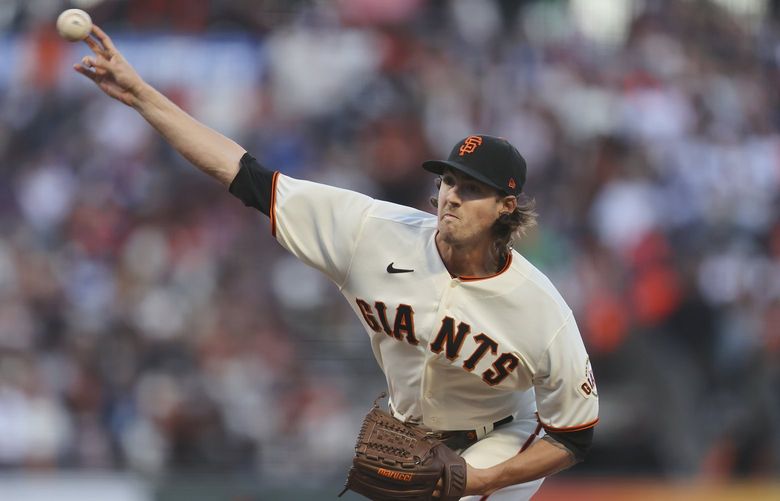 San Francisco Giants’ Kevin Gausman pitches against the Los Angeles Dodgers during the first inning of Game 2 of a baseball National League Division Series Saturday, Oct. 9, 2021, in San Francisco. (AP Photo/John Hefti)