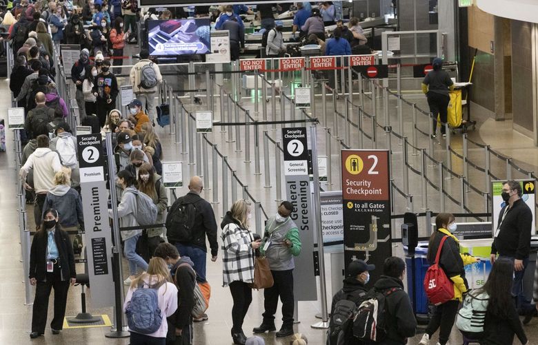 Lines move quickly through security checkpoints at SEA (Seattle-Tacoma International Airport) early Wednesday morning, November 24, 2021, the second busiest day of the year.  Wait times were pretty much five to ten minutes all morning. Staffing and travelers showing up early made the wait times very manageable.  TSA and SEA staffing helped get people through efficiently to meet the increased volumes of the day.  The use of SEA Spot Saver also helped to reduce the general lines as well, the airportâ€™s new free option for general screening.  136,000 are projected to go through the airport on the Monday after Thanksgiving, 132,000 are projected for Wednesday, November 24, 2021, the day before. 218908