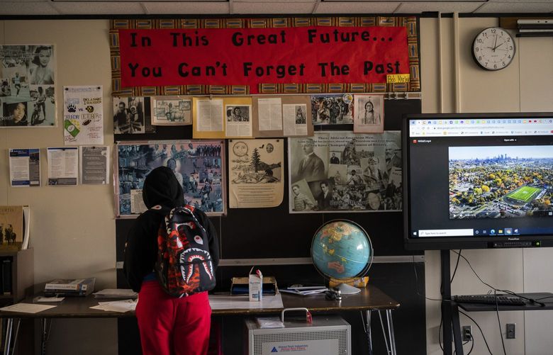 Black history tributes on a classroom wall at North Community High in Minneapolis, Nov. 22, 2021. In a citywide overhaul, this beloved majority-Black high school was rezoned to include more white students from a richer neighborhood. It has been hard for everyone. (Andrea Ellen Reed/The New York Times)