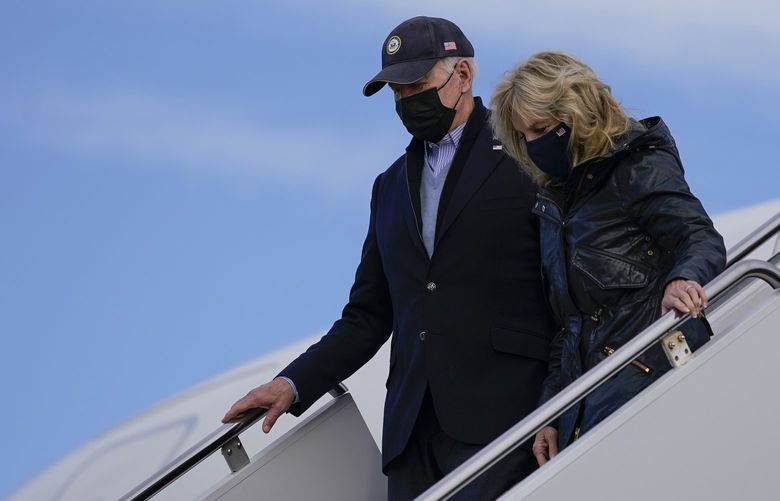 President Joe Biden and first lady Jill Biden arrive on Air Force one at Andrews Air Force Base, Md., Sunday, Nov. 28, 2021, as they return from Nantucket, Mass. (AP Photo/Carolyn Kaster) MDCK108 MDCK108