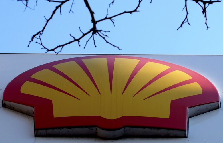 FILE – The Shell logo at a petrol station in London on Jan. 20, 2016. Royal Dutch Shell proposed moving its headquarters from the Netherlands to the United Kingdom and streamlining its structure in hopes of making it easier to move forward in a world transitioning away from a dependence on fossil fuels. (AP Photo/Kirsty Wigglesworth, File) FP101 FP101