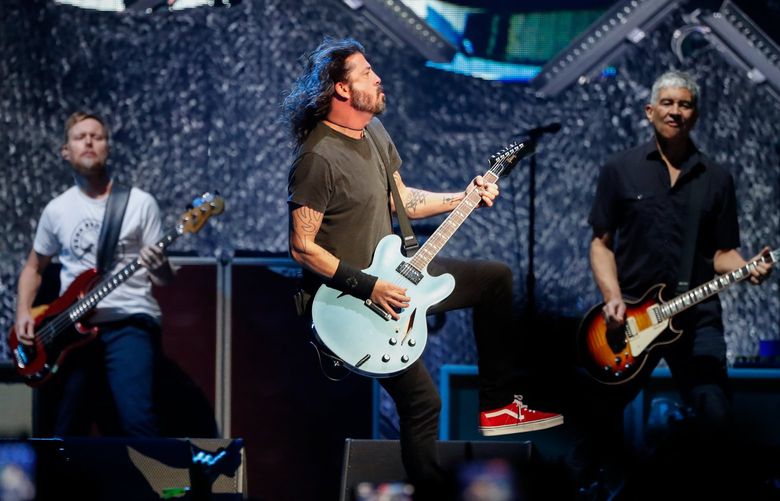 Climate Pledge Arena – Foo Fighters concert – 101921
From left, Nate ?Mendel, Dave Grohl and Pat Smear of the Foo Fighters perform at Climate Pledge Arena Tuesday Oct. 19, 2021, in Seattle. 218542