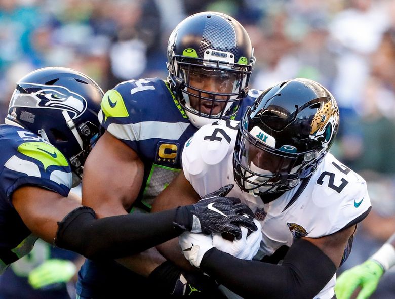 Watch: Bobby Wagner tackles fan that runs onto the field vs. 49ers