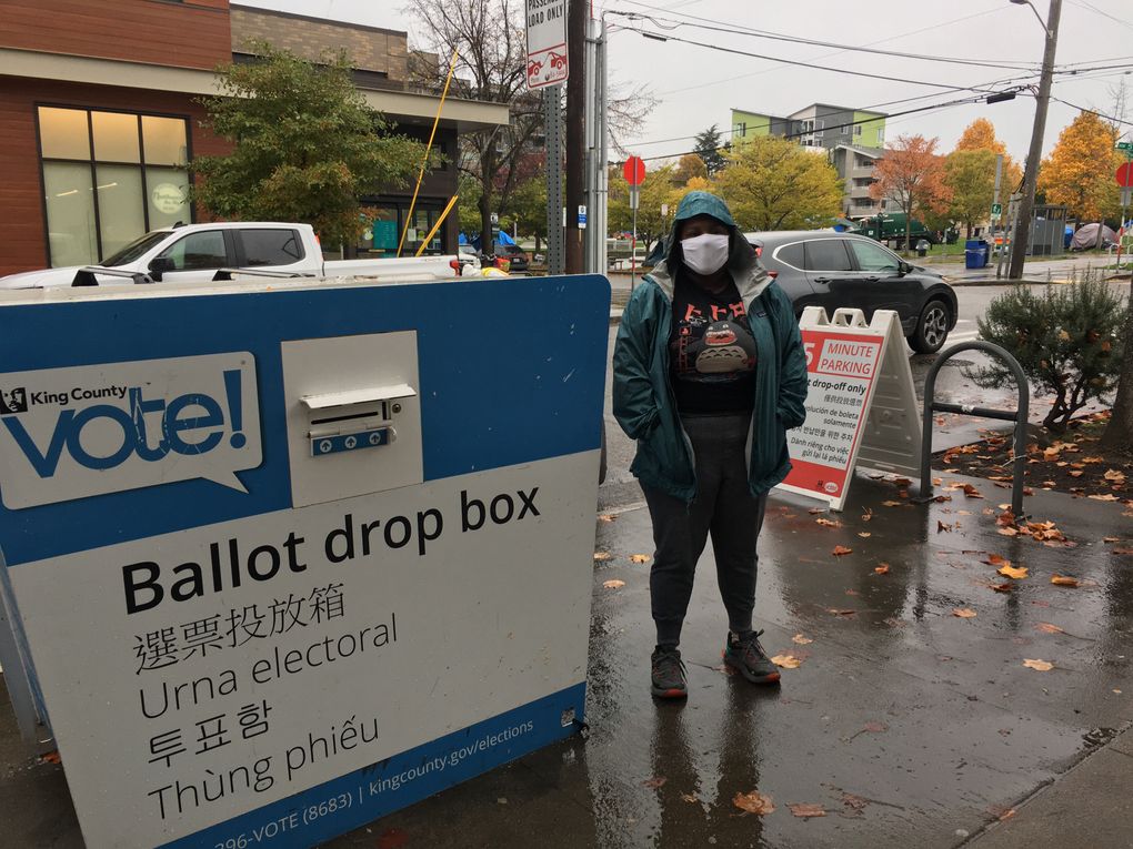 Dah-ve Bell, 33, lives next to a tent encampment at Ballard Commons Park. “I voted for who I thought would offer immediate solutions to address and mitigate homelessness,” she said. (Lewis Kamb / The Seattle Times)