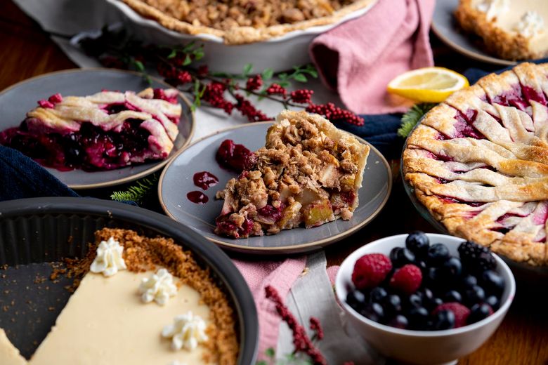 Lemon pie, cranberry-pear pie with crumble topping (center) and berry-ginger pie with spoke lattice crust baked by Seattle Times producer Taylor Blatchford.
Recipes adapted from Live Well Bake Often, Sallyís Baking Addiction and Pieometryí by Lauren Ko
(Amanda Snyder / The Seattle Times)