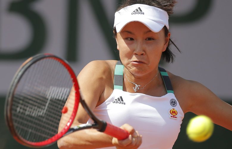 FILE – China’s Shuai Peng plays a shot against Romania’s Sorana Cirstea during their first round match of the French Open tennis tournament at the Roland Garros stadium, in Paris, France. Tuesday, May 30, 2017. Chinese authorities have squelched virtually all online discussion of sexual assault accusations apparently made by the Chinese professional tennis star against a former top government official, showing how sensitive the ruling Communist Party is to such charges. (AP Photo/Michel Euler, File) XHG204 XHG204
