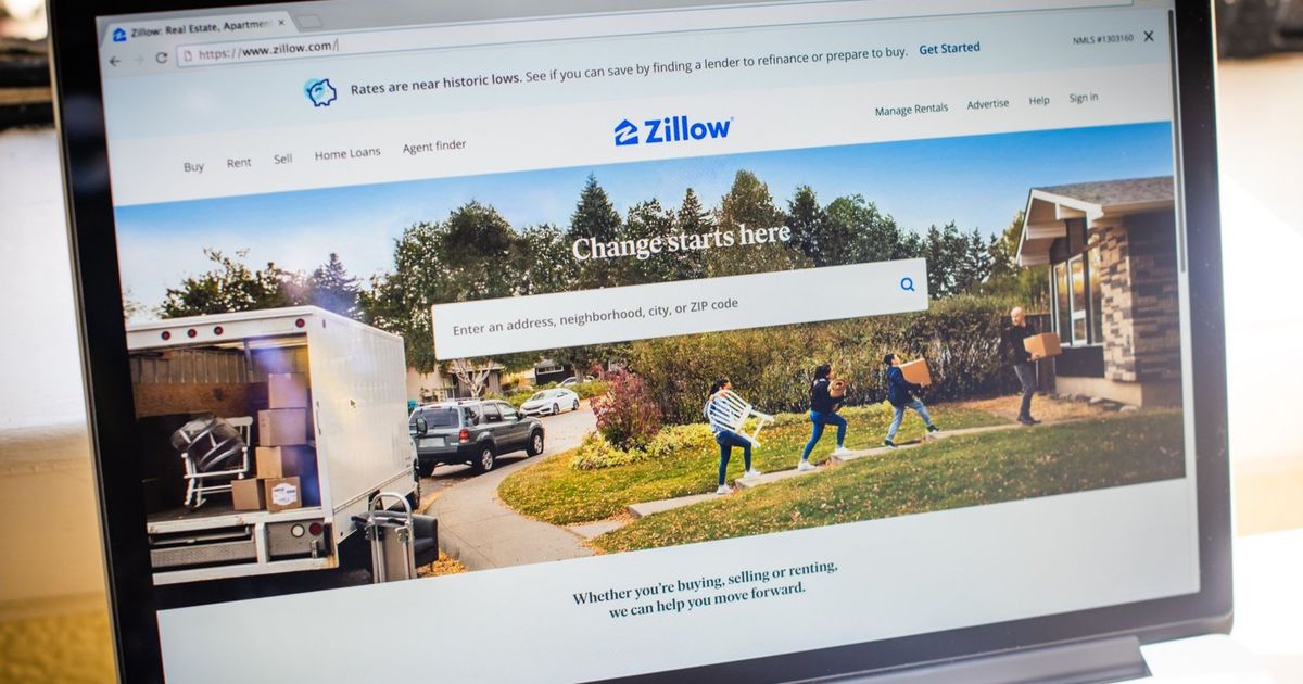 Zillow shares plunge after announcing staff cuts and closing home