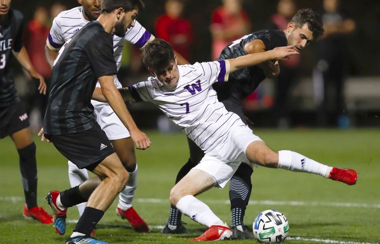 Championship Field, Seattle University – University of Washington Huskies at Seattle U soccer – 092021
WashingtonÃs Chris Meyers tries to get a shot off while surrounded by Seattle UÃs Alex Acton-Petronotis, left, and Hal Uderitz during the first half Sept. 20, 2021, in Seattle. 218269