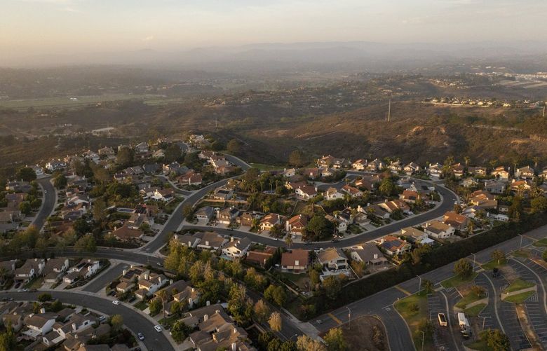 FILE — Homes in a well-to-do neighborhood of San Diego, July 21, 2021. The response to a plan in Congress to give tax cuts to wealthy homeowners in some high-tax states has put some Democrats on the defensive. (Roger Kisby/The New York Times) XNYT150 XNYT150