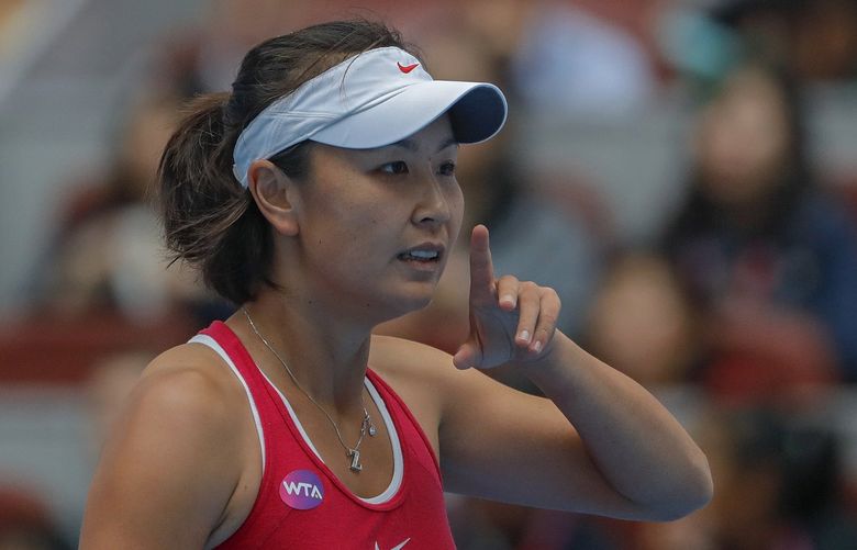 Chinese tennis player Peng Shuai reacts during her women’s singles match at the China Open tennis tournament in Beijing on Oct. 5, 2016. When Peng disappeared from public view this month after accusing a senior Chinese politician of sexual assault, it caused an international uproar. But back in China, Peng is just one of several people, activists and accusers alike, who have been hustled out of view, charged with crimes or trolled and silenced online for speaking out about the harassment, violence and discrimination women face every day. (AP Photo/Andy Wong) XHG301 XHG301