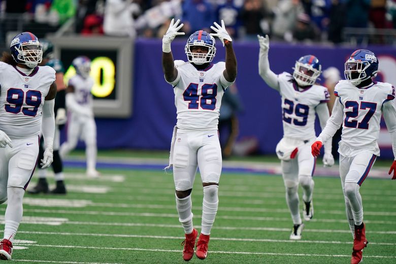 New York Giants free safety Xavier McKinney (29) celebrates his