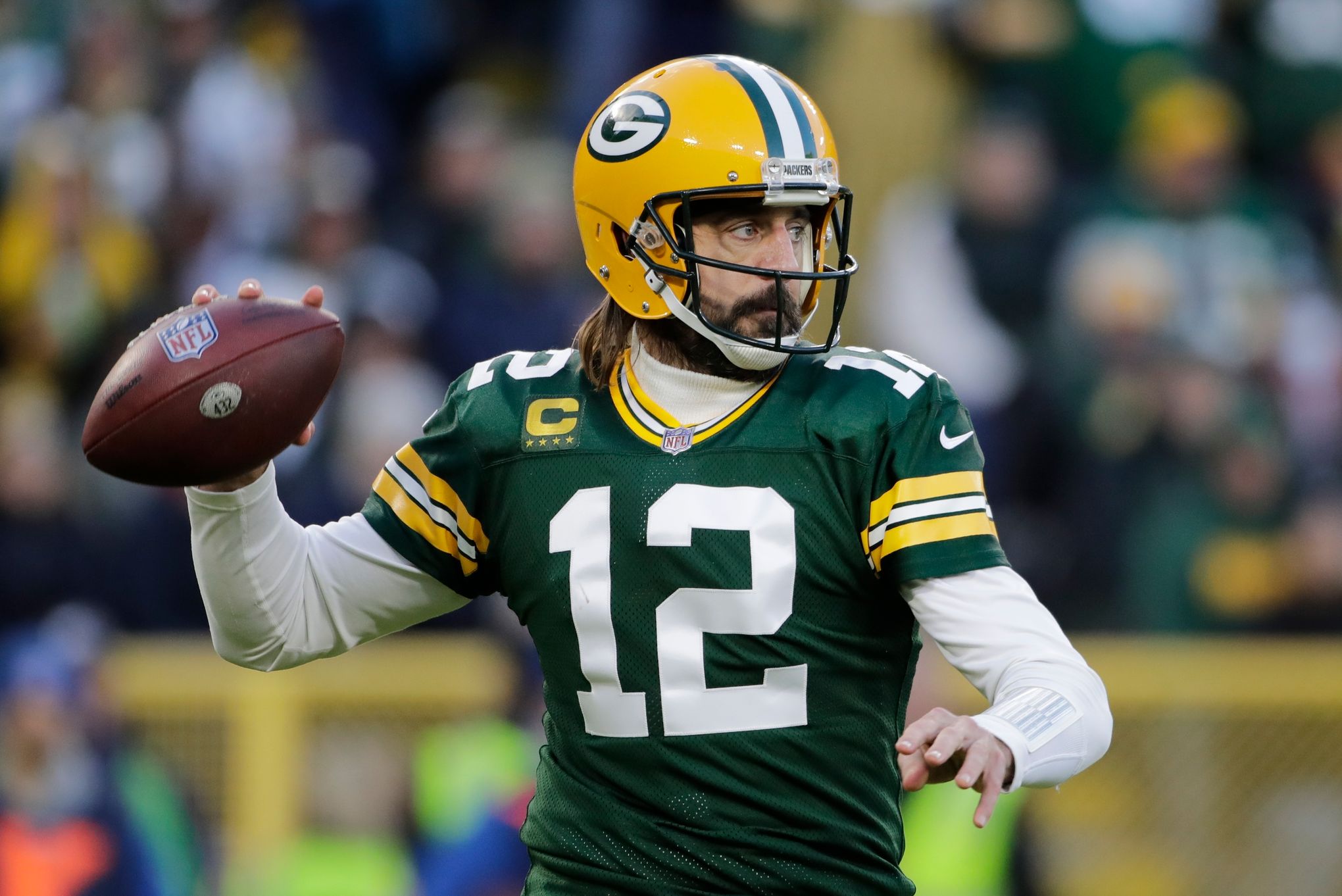 Green Bay Packers quarterback Danny Etling (19) runs for a