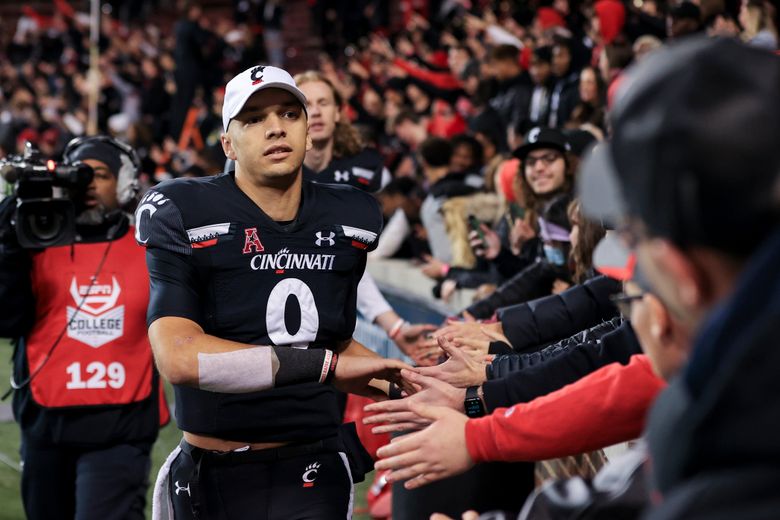 Who is Desmond Ridder? Cincinnati QB's historic career leads to College  Football Playoff