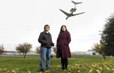 Velma Veloria, left, and Rosario-Maria Medina pose at Ruby Chow Park in Seattle’s Georgetown neighborhood earlier this month. The activists are pursuing the construction of green walls to help mitigate noise and pollution from Boeing Field aircraft. (Dan DeLong / InvestigateWest via The Associated Press)