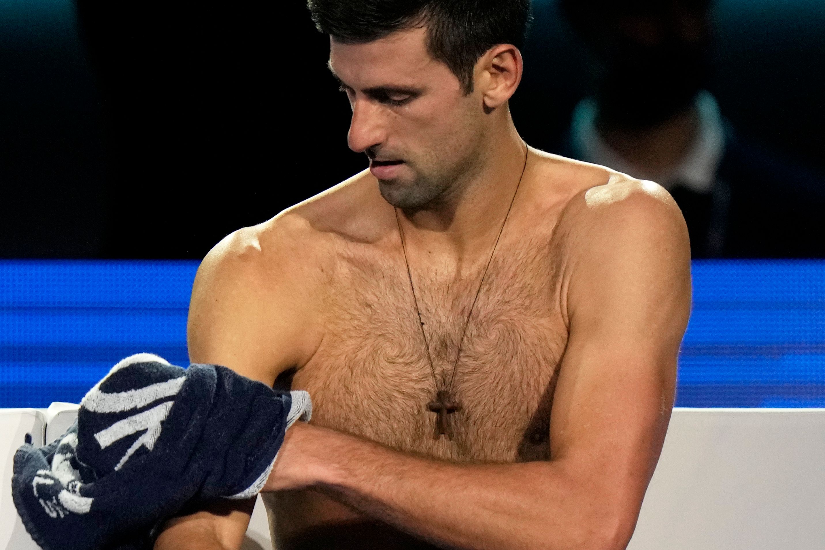 Novak takes shirt off during match break with Millman - ESPN Video