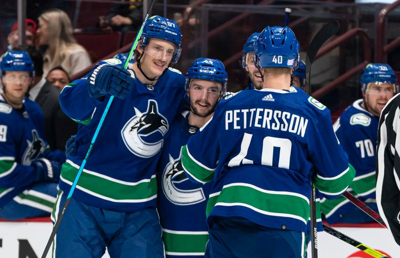 Power-play goals push Vancouver over Winnipeg, 3-2