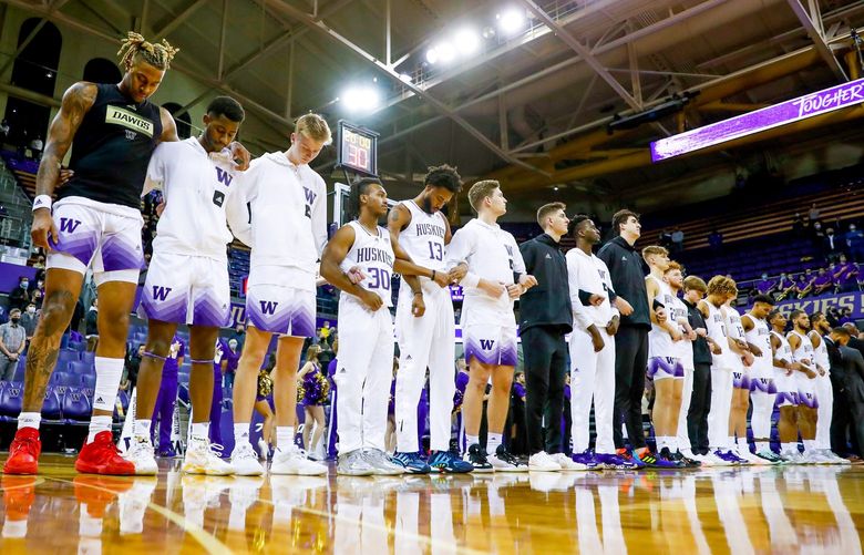 Alaska Airlines Arena at Hec Edmundson Pavilion – University of Washington Huskies vs. Northern Illinois Huskies menÃs basketball – 110921
The Washington Huskies line up for the playing of the national anthem Tuesday, Nov. 9, 2021, in Seattle. 218734 218734