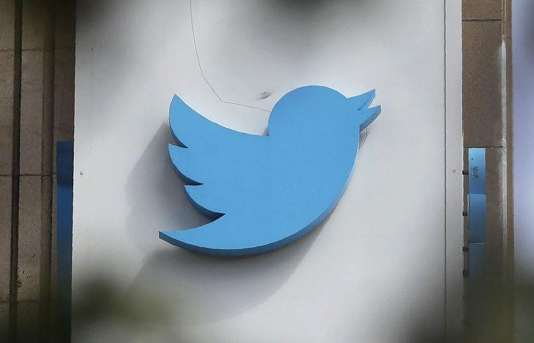 FILE – This July 9, 2019 file photo shows a sign outside of the Twitter office building in San Francisco.  (AP Photo/Jeff Chiu, File) 