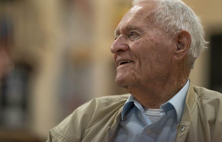 Pearl Harbor survivor and World War II Navy veteran David Russell, 101, talks with fellow veterans while eating breakfast at the American Legion Post 10 on Monday, Nov. 22, 2021, in Albany, Ore. (AP Photo/Nathan Howard) ORNH109 ORNH109