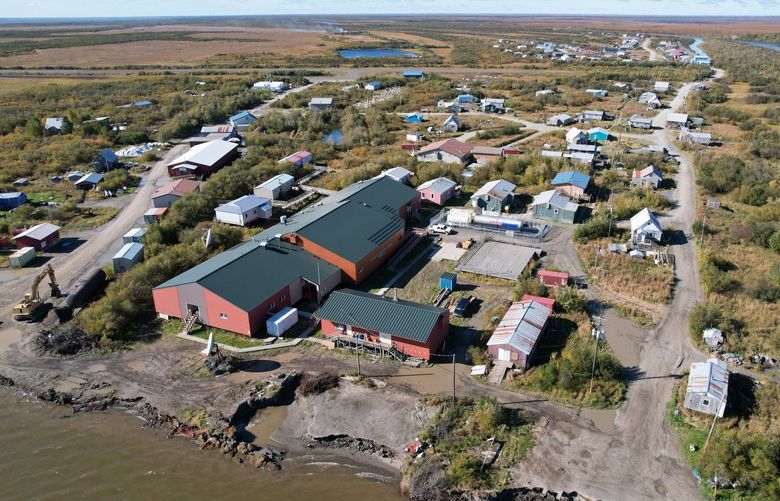 An aerial view of Napakiak, a Yup’ik village on a small island in Western Alaska that is threatened by the encroaching Kuskokwim River. MUST CREDIT: Photo by Katie Basile for The Washington Post.