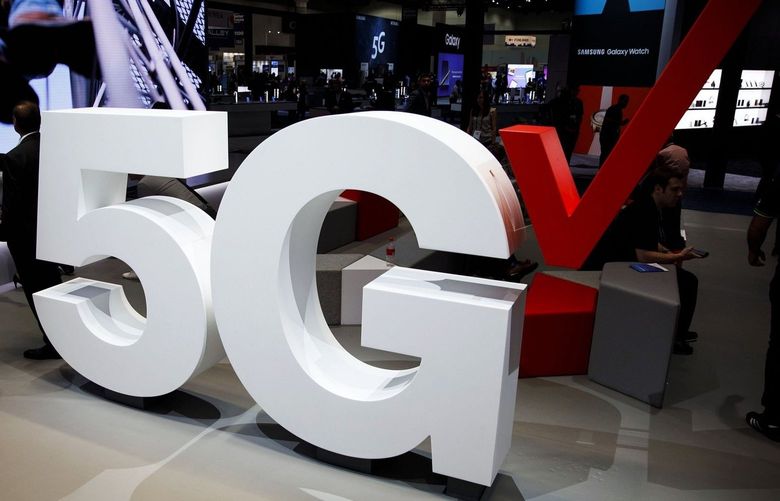 Verizon Communications Inc. 5G wireless signage is displayed at the company’s booth during the Mobile World Congress Americas in Los Angeles, California, U.S., on Wednesday, Sept. 12, 2018. The conference features prominent executives representing mobile operators, device manufacturers, technology providers, vendors and content owners from across the world.