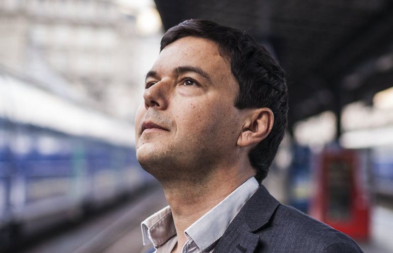 Thomas Piketty, a French economist whose work “Capital in the Twenty-First Century” has fueled fierce debates about inequality, waits for a train near his home in Paris, April 11, 2014. Piketty’s work forecasts sharply increasing inequality in industrialized countries and expects the concentration of wealth to have a damaging effect on the democratic values of justice and fairness. (Ed Alcock/The New York Times) — PHOTO MOVED IN ADVANCE AND NOT FOR USE – ONLINE OR IN PRINT – BEFORE APRIL 20, 2014.