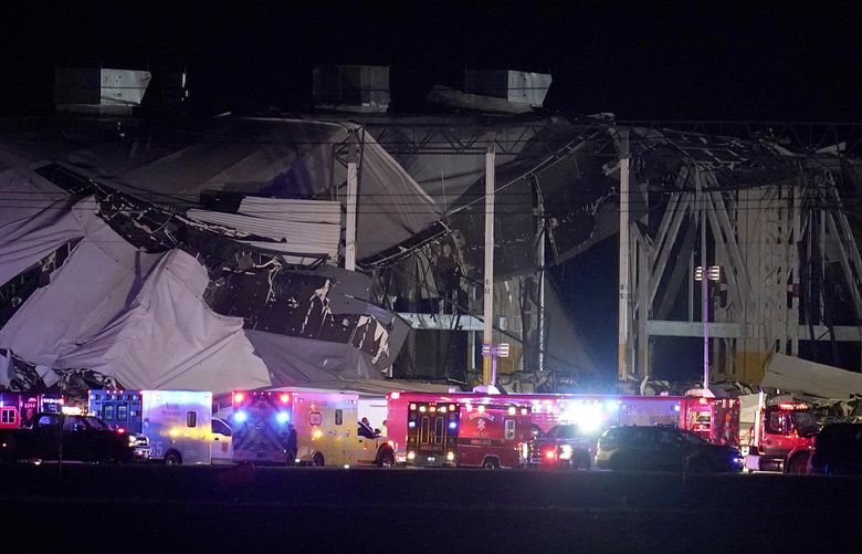 An Amazon distribution center is heavily damaged after a strong thunderstorm moved through the area Friday, Dec. 10, 2021, in Edwardsville, Ill. Tornadoes and severe weather were blamed for several deaths and injuries across parts of the Midwest and the South as a storm system caused significant damage at a candle factory in Kentucky, an Amazon facility in Illinois, a nursing home in Arkansas, and numerous homes and buildings.(AP Photo/Jeff Roberson) ILJR101 ILJR101