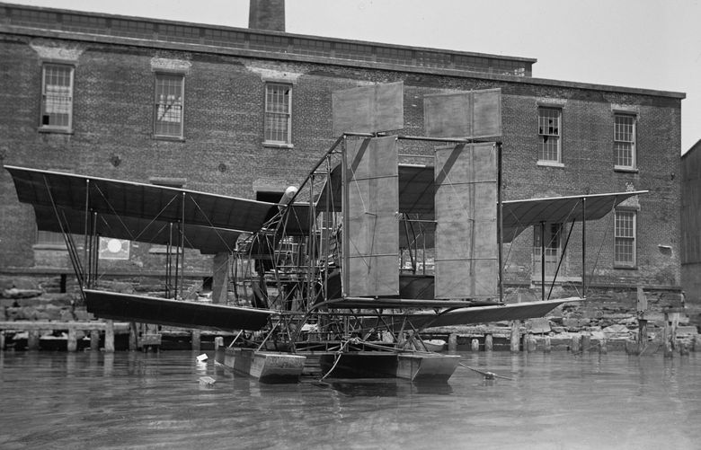 Samuel Pierpont Langley, secretary of the Smithsonian Institution, with an experimental biplane on the Potomac, c. 1917. MUST CREDIT: Library of Congress.