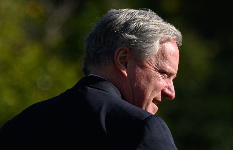 FILE – Mark Meadows, the White House chief of staff, departs the White House, Oct. 14, 2020. The House committee investigating the Jan. 6, 2021 attack on the Capitol is scrutinizing a 38-page PowerPoint document tuned over by Meadows that called for extreme actions to keep President Donald Trump in power despite losing the election. (Erin Scott/The New York Times) XNYT186 XNYT186