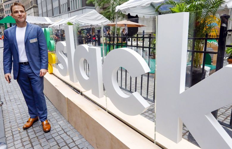 Slack CEO Stewart Butterfield poses for photos outside the New York Stock Exchange before his company’s IPO, Thursday, June 20, 2019. (AP Photo/Richard Drew) NYRD103