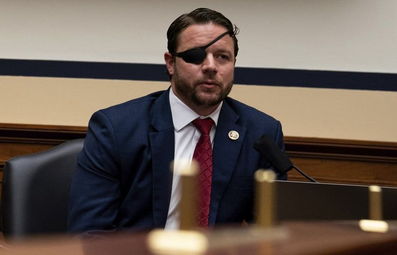 FILE — Rep. Dan Crenshaw (R-Texas) speaks during a House Committee on Homeland Security meeting in Washington on July 22, 2020. Rep. Crenshaw’s campaign claimed in an email that the Democrats’ budget bill included Medicare for all. It doesn’t. (Anna Moneymaker/The New York Times)